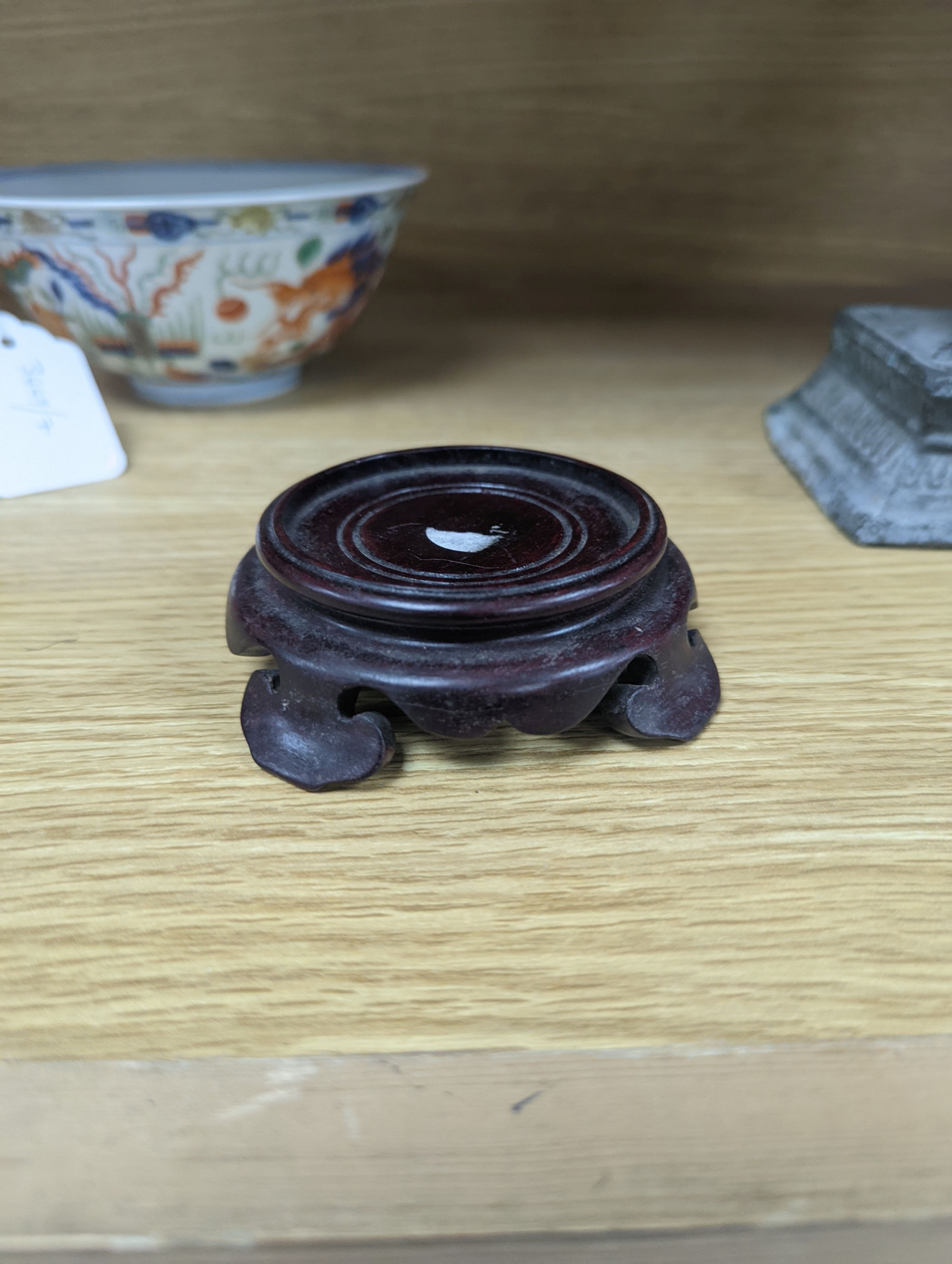 A Wucai bowl, dragon and flamingo pearl decoration, Jiaqing mark, on wood stand. 16cm diameter